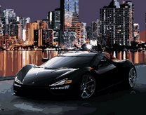 Черный спортивный автомобиль в ночном городе